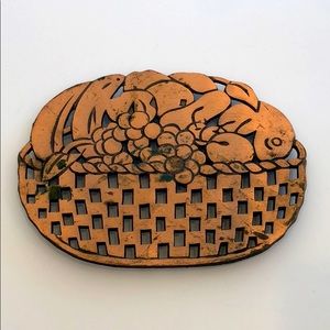 Vintage copper finished cast iron trivet